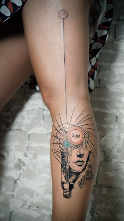 geometric collage style leg tattoo with girl face sun and a