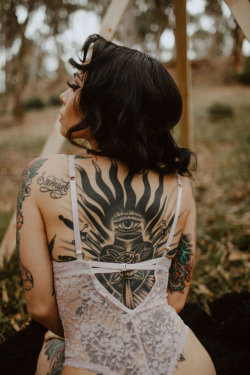 black traditional back piece done by mike d md82art at old