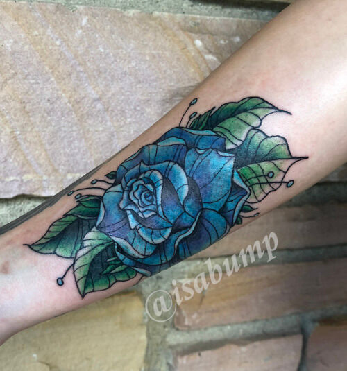 blue rose wrist tattoo done by izzy bump at intimate body art