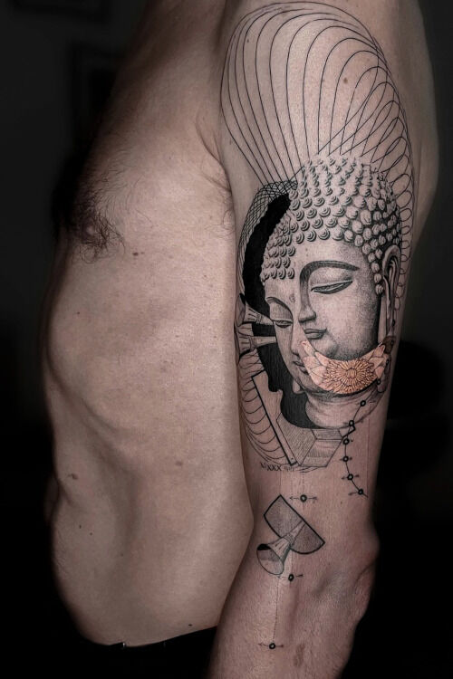 buddha tattoo on arm with geometric elements in graphic