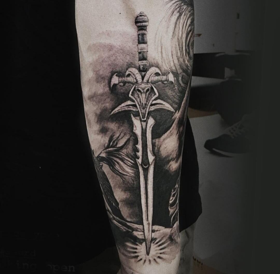 Sword tattoo by @joseneedles at Arlia Tattoo in Orlando FL