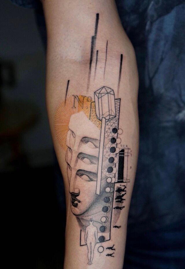 graphic tattoo with human face and