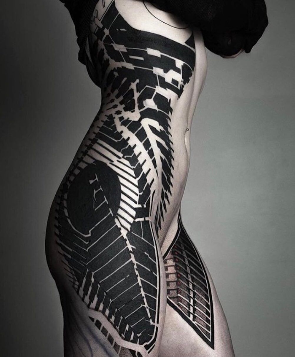 Black tattooing by © Brad Wooten